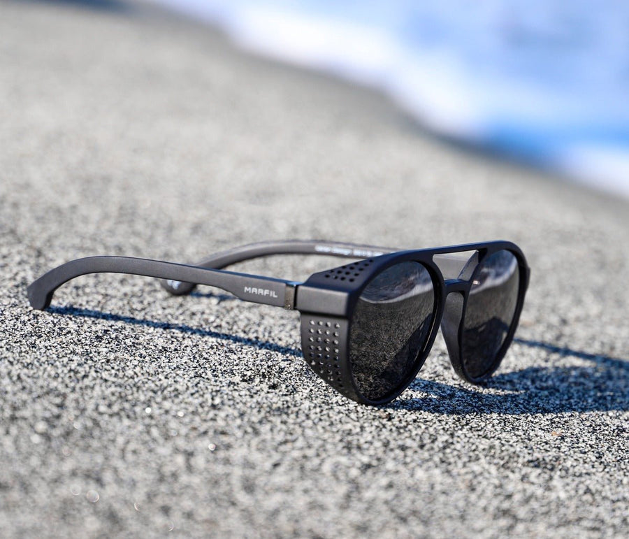 Gafas Marfil Orion en la playa