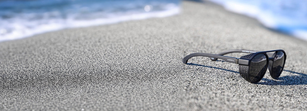 Gafas Marfil Orion en la playa