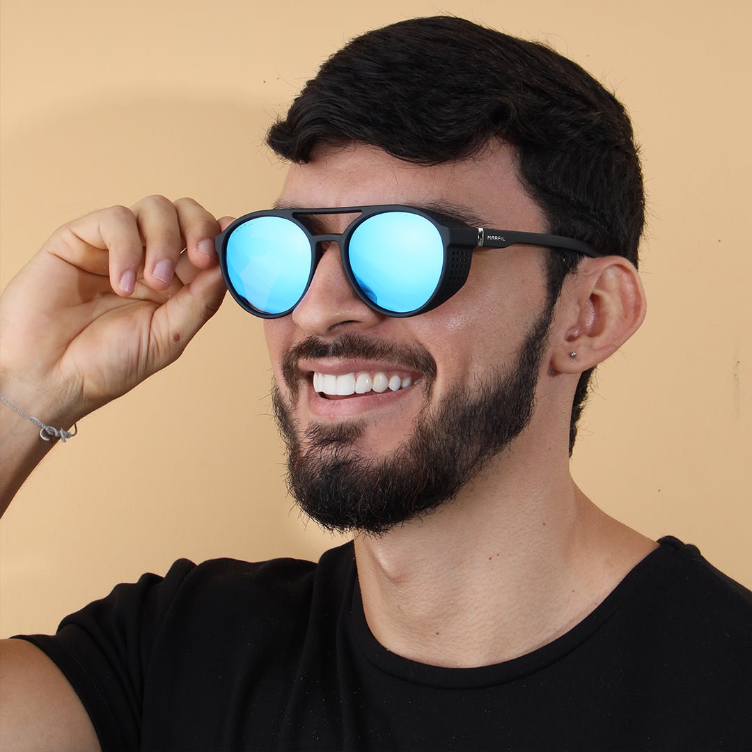 GAFAS DE SOL MARFIL ORIÓN NEGRO CELESTE - Marfil Oficial